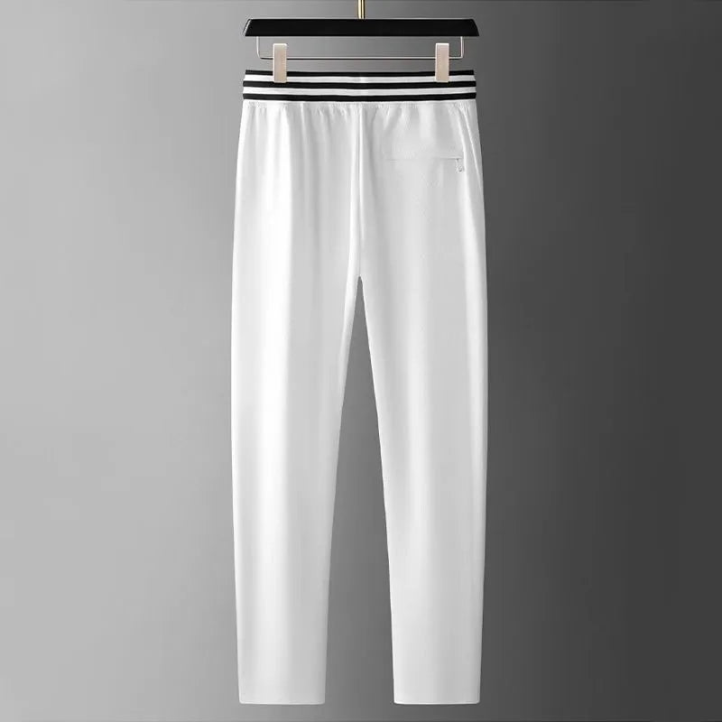 High end fashionable embroidered striped casual men's pants for the summer of 2024 new waffle ice silk comfortable sports pants