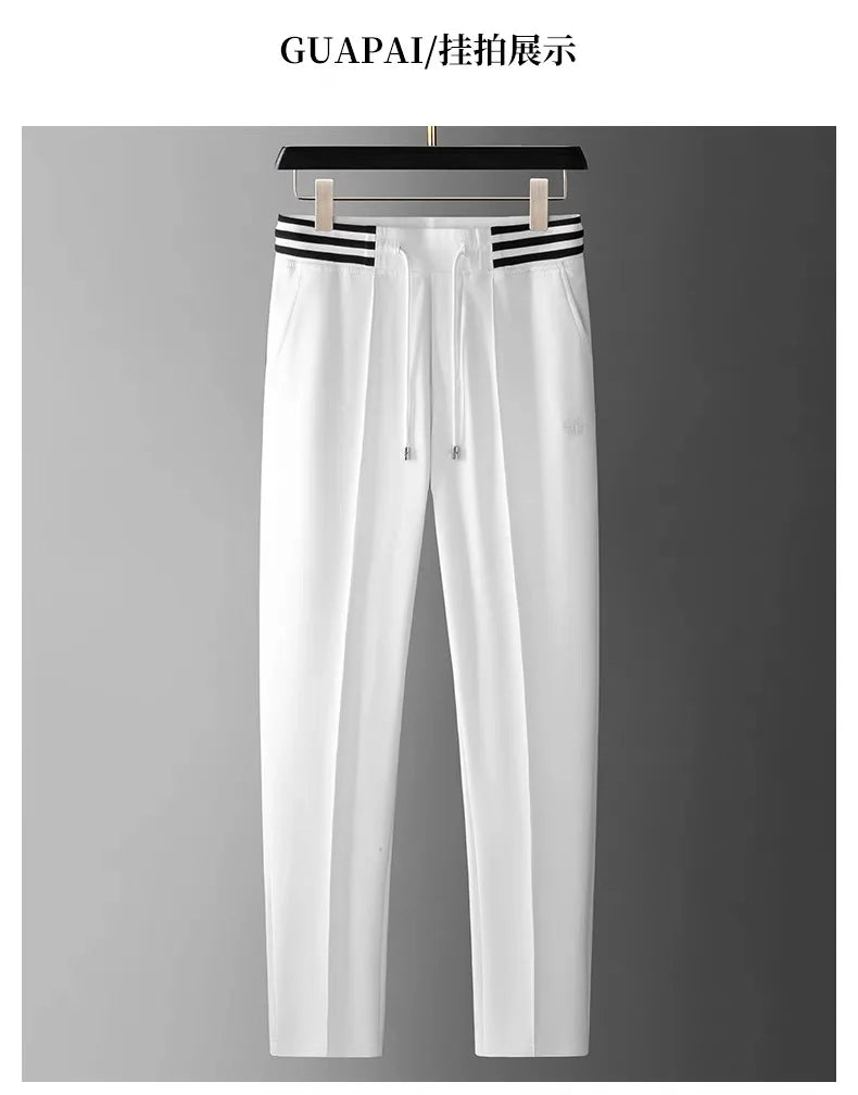 High end fashionable embroidered striped casual men's pants for the summer of 2024 new waffle ice silk comfortable sports pants