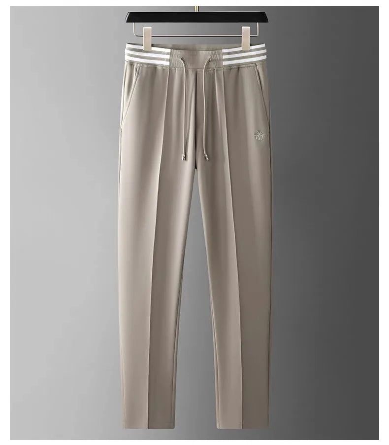 High end fashionable embroidered striped casual men's pants for the summer of 2024 new waffle ice silk comfortable sports pants