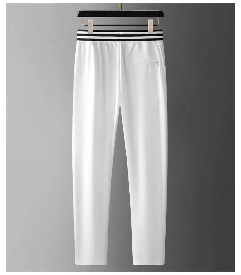 High end fashionable embroidered striped casual men's pants for the summer of 2024 new waffle ice silk comfortable sports pants